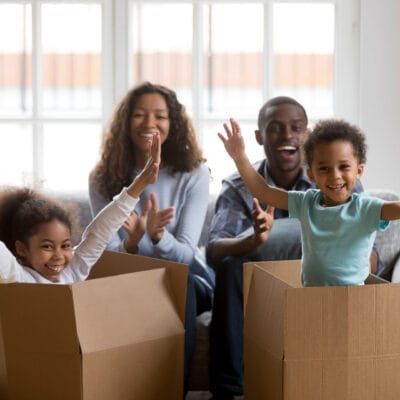 Kids playing in boxes
